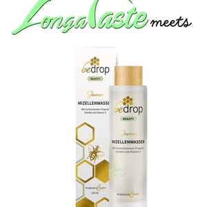 May include: A skincare product with the brand name "bedrop" is displayed. The product is a micellar water, with a wooden cap and a white label. The label includes the text "MIZELLENWASSER" and "#natürlich Biere". The bottle contains 150 ml of product.