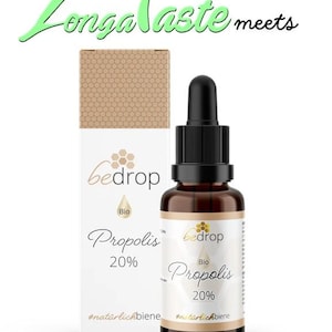May include: A brown glass bottle of "bedrop" Bio Propolis 20% with a black dropper, next to a white box with the same branding. The text "Longa Taste meets" is above the bottle.