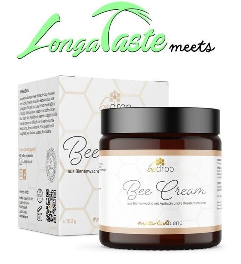 May include: A jar of "Bee Cream" with a black lid and a white label, next to a white box with the same branding. The cream is made with beeswax, apitoxin, and 8 herbal extracts. The jar contains 100g of cream.