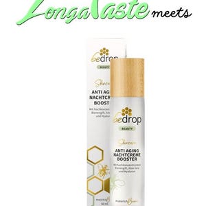 May include: A skincare product with a wooden cap and a white box. The product is labeled "bedrop BEAUTY" and "ANTI AGING NACHTCREME BOOSTER". The box features a honeycomb design and the text "Longa Taste meets". The bottle contains 50 ml.