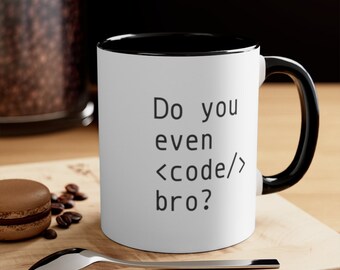 May include: A white ceramic mug with a black interior and handle. The exterior features the black printed text: Do you even <code/> bro? The mug has a cylindrical shape and a smooth finish, displaying clear, dark lettering against the white surface.
