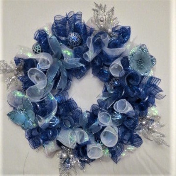 blue light and dark mesh wreath with butterfly and silver sprig accents