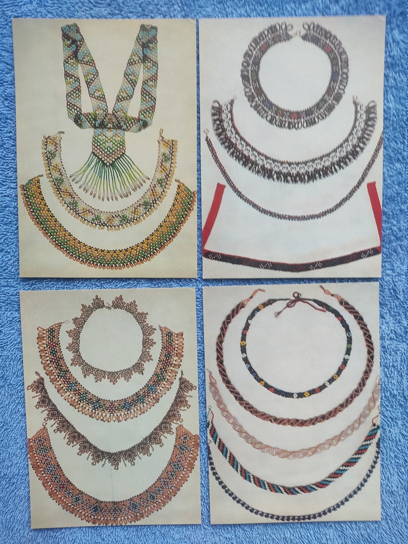 May include: Four vintage illustrations of beaded necklaces. The necklaces feature various designs, including intricate patterns and fringe. The color palette includes shades of green, yellow, blue, red, and brown. The illustrations are on a cream-colored background.