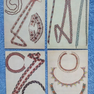 May include: Four vintage prints showcasing beaded jewelry designs. The pieces include necklaces, belts, and decorative elements, featuring red, black, and white beads. The designs are intricate, with geometric and floral patterns.
