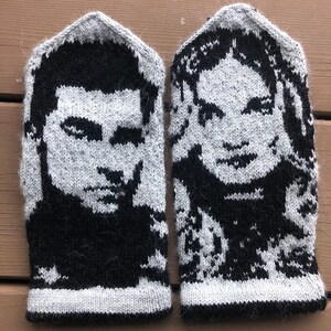 May include: A pair of knitted fingerless gloves with black and white images of a man and a woman's faces.