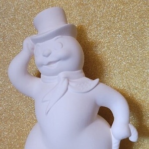 Ceramic bisque ready to paint snowman with candy cane poured from vintage mold. Bisque snowman wearing a top hat. Snowman ceramics