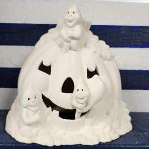 Bisque Ceramic Ghosts Carving a Pumpkin, Getting Ready for Trick-or-Treat. Ready to Paint - Ceramic Halloween Favorite! Light up decor.