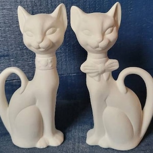 Ceramic bisque ready to paint ceramic cats. Set of two stately cool cats. Collar and bow adornments. Made from vintage mold. Retro cats.