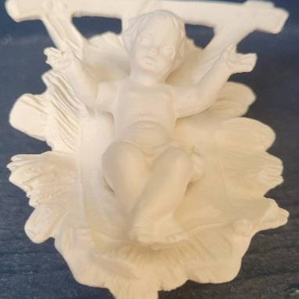 Ceramic Christmas bisque infant baby Jesus and cradle. Unpainted bisque. Removable baby, 2 pieces.