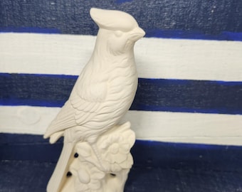 Ceramic Bisque ready to paint red bird with flowers.