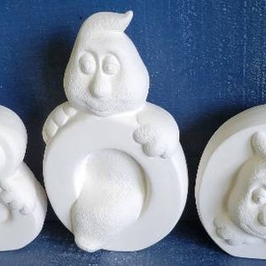 Halloween Ceramic BOO ghosts in bisque, ready to paint yourself. Ghost characters in and on letters. Halloween bisque ghosts.