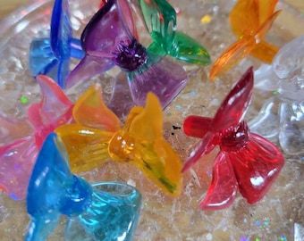 Ceramic Christmas tree bows. Multi color tree lights. Christmas bow shaped lights. Acrylic plastic lights for ceramic trees