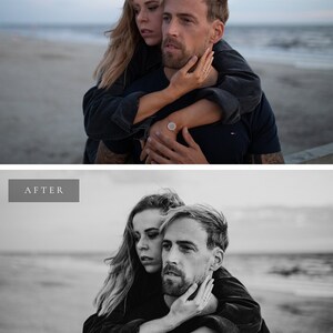 May include: A black and white photo of a couple embracing on a beach. The woman is holding the man's face with her hand and the man is looking at the camera. The couple is wearing casual clothing and the background is a blurred out beach scene.