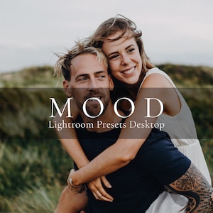 May include: A couple is embracing in a field of green grass. The man is wearing a black shirt and the woman is wearing a white tank top. The text "MOOD Lightroom Presers Desktop" is displayed on a black bar.