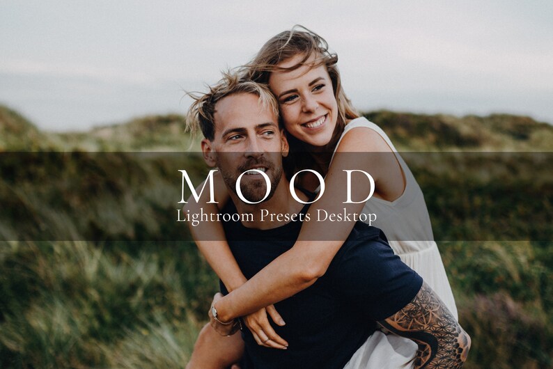 May include: A couple is embracing in a field of green grass. The man is wearing a black shirt and the woman is wearing a white tank top. The text "MOOD Lightroom Presers Desktop" is displayed on a black bar.
