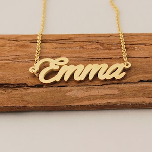 May include: A gold necklace with the name "Emma" spelled out in cursive.
