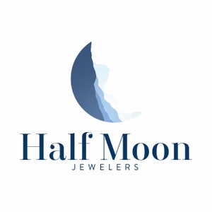 May include: A logo for a jewelry store called "Half Moon Jewelers". The logo features a stylized blue crescent moon.