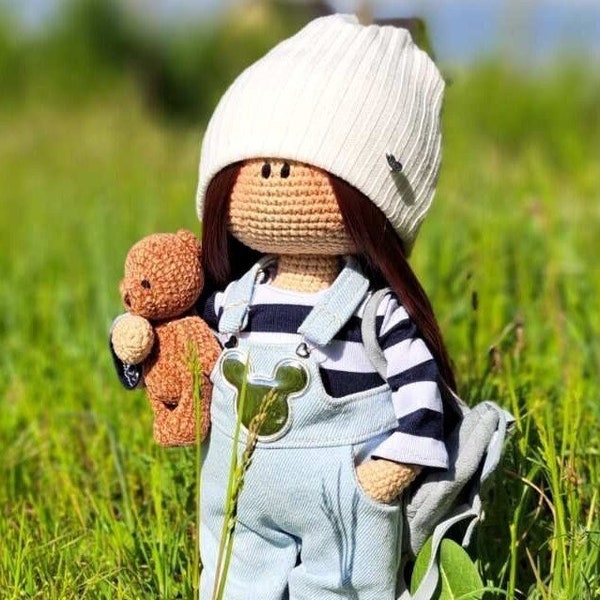 Doll for sale with realistic brown hair in blue jeans crochet doll in sewed clothes with detailed acccessoires