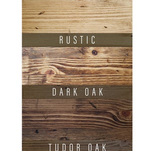May include: Five wood samples showing different wood stain colors. The colors are Clear, Rustic, Dark Oak, Tudor Oak, and Jacobean. The samples are arranged vertically with the lightest color at the top and the darkest color at the bottom. The samples are labeled with the color name in white text.