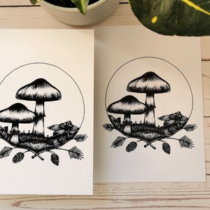 May include: Black and white line art print of three mushrooms in a circle with leaves and berries around them.