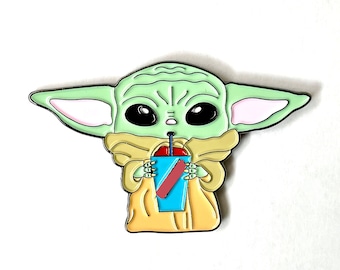 Grogu “slurping a drink” enamel pin