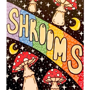 May include: A psychedelic illustration of red and white mushrooms with white spots against a black background with white stars and a rainbow arc. The word "SHROOMS" is written in yellow letters with a rainbow background.