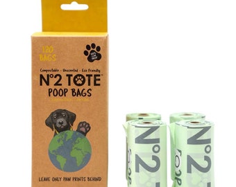 May include: A box of 120 compostable, unscented, eco-friendly poop bags with a cartoon dog and the text "N°2 TOTE POOP BAGS" on the front. The box is yellow and brown. There are four rolls of green poop bags with the text "N°2 T" on them.