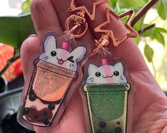 Llaveros Boba con purpurina de conejito y gatito