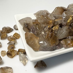 Tumbled Golden Rutilated Quartz: Natural Shape, Positive Energy