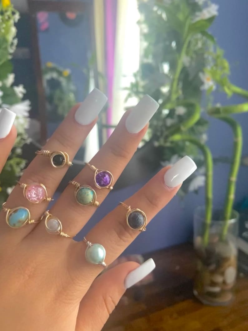 Wire wrapped rings with glass or plastic bead