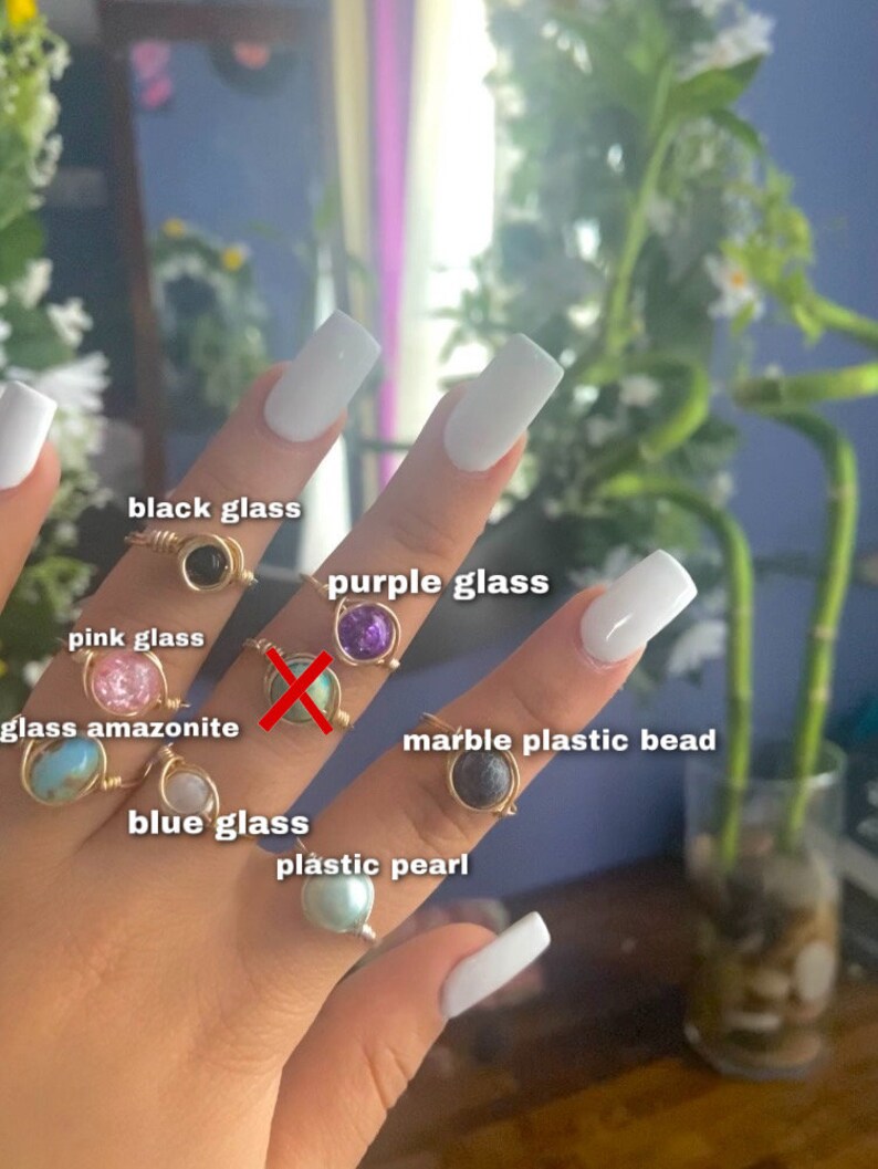 Wire wrapped rings with glass or plastic bead