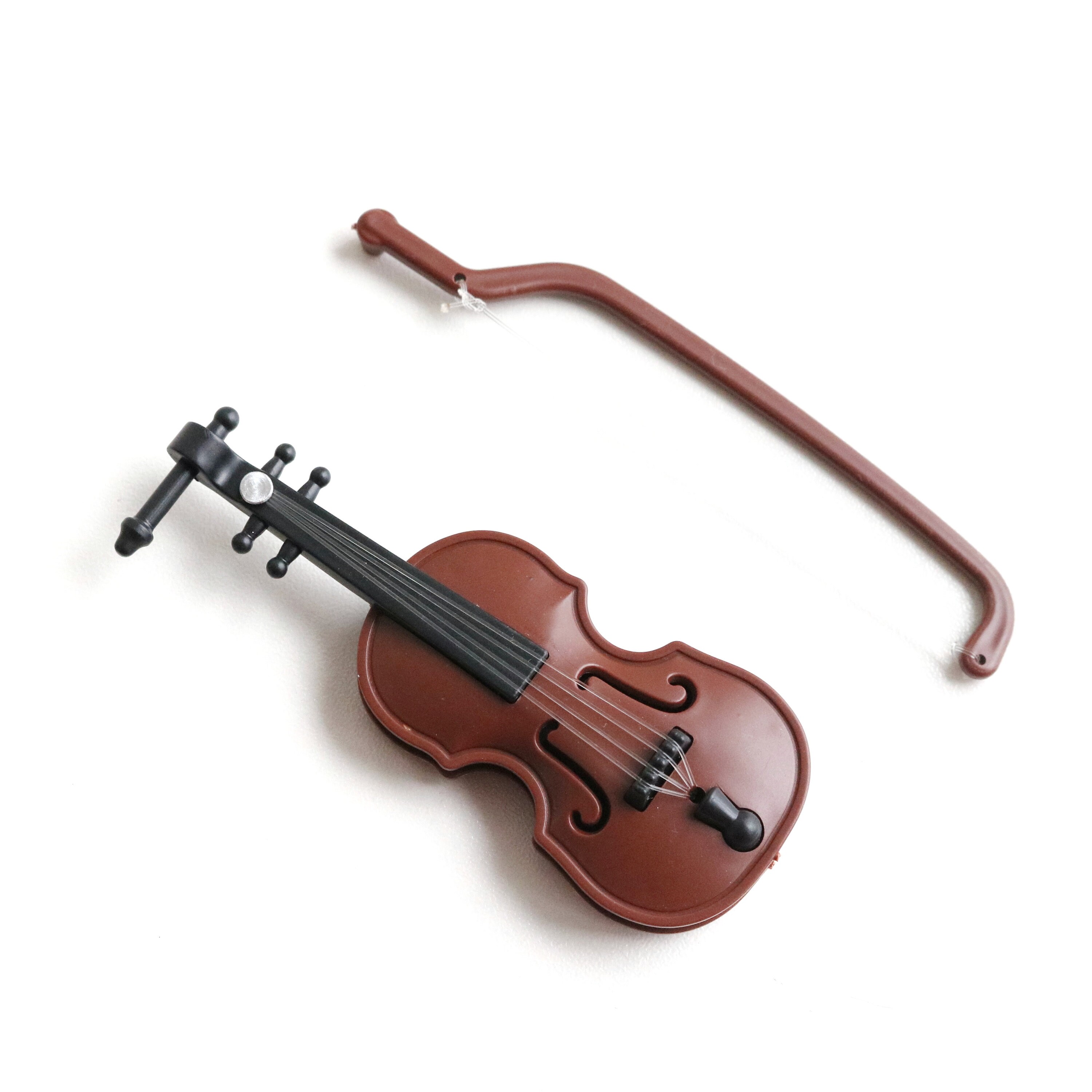 doll with violin