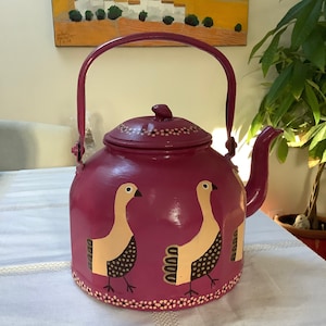 Hand-painted iron kettle with duck patterns