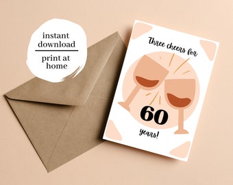 May include: Printable 60th birthday card with a pink background and two wine glasses clinking. The text reads "Three cheers for 60 years!"