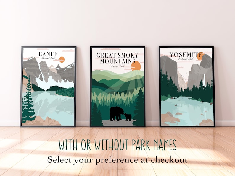 May include: Three framed prints of national parks with a minimalist design. The prints feature a mountain range, a forest, and a waterfall. The prints are labeled "Banff National Park", "Great Smoky Mountains National Park", and "Yosemite National Park".