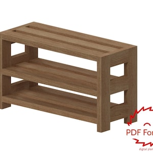 May include: A wooden shoe rack with two shelves. The rack is made of light brown wood and has a simple, rectangular design.