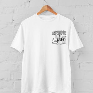 May include: White t-shirt with a black graphic that says "All I want is Ice Coffee & Lashes" with a drawing of a glass of iced coffee.