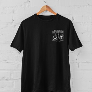 May include: Black t-shirt with a white graphic that says "All I want is ice coffee & lashes".
