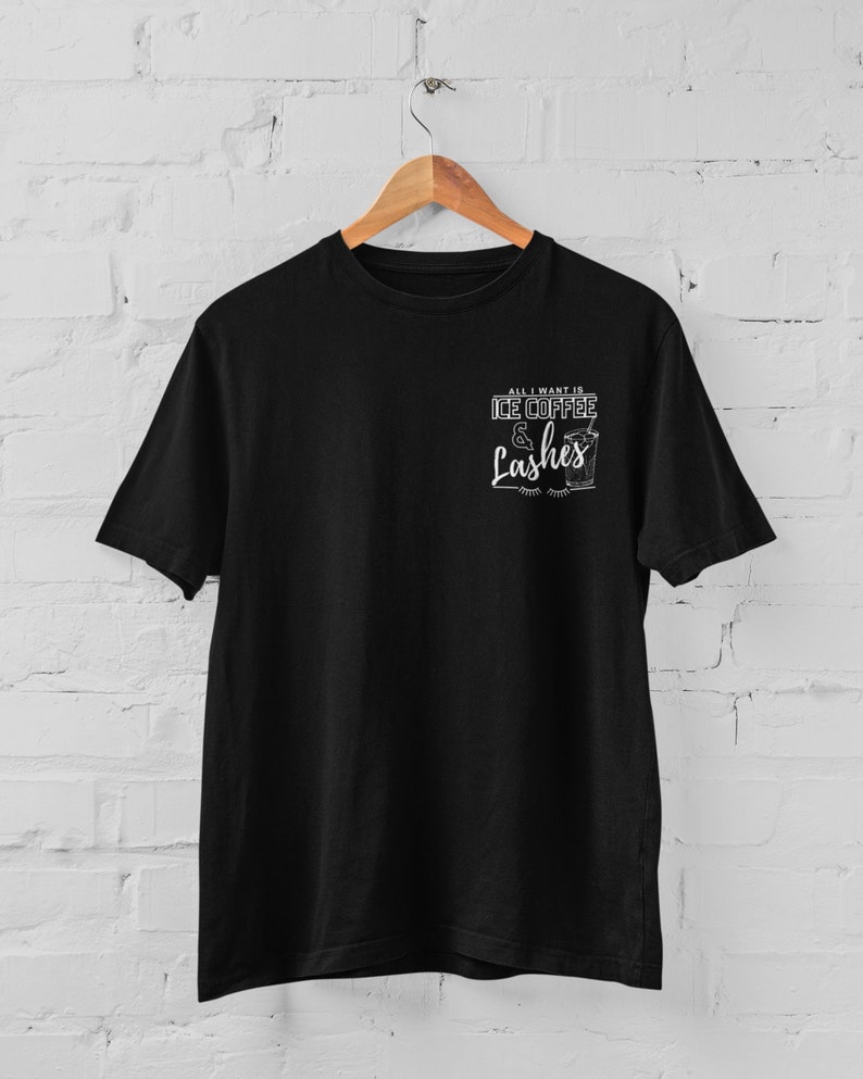 May include: Black t-shirt with a white graphic that says "All I want is ice coffee & lashes".
