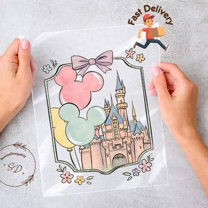 May include: A clear plastic bag featuring a colorful illustration of Mickey Mouse balloons and a castle. The bag is held by two hands. The words "Fast Delivery" are written above a cartoon delivery person.