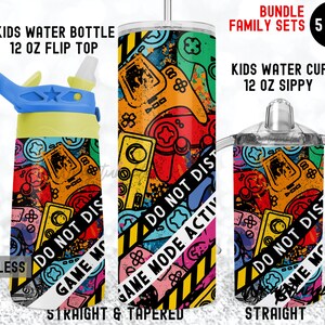 May include: A set of five digital downloads for sublimation designs featuring a colorful pattern of video game controllers and the text "Game Mode Active Do Not Disturb". The designs are for a 12-ounce flip top water bottle, a 12-ounce sippy cup, and a straight and tapered tumbler.