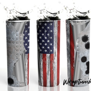 May include: Three stainless steel tumblers with different designs. The first tumbler has a distressed American flag design with a ripped metal panel. The second tumbler has a distressed American flag design with a wood grain background. The third tumbler has a distressed American flag design with a ripped metal panel with bullet holes.