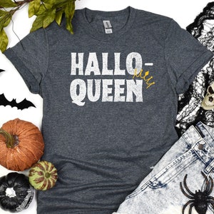 May include: A dark heather grey t-shirt with the text "Hallo-ween Queen" in white with a gold crown above the "Queen".