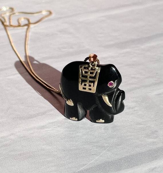 Onyx and 14KT gold Elephant Charm with Ruby eyes P