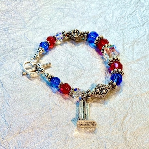 NEVER FORGET         A bracelet remembering New York City World Trade Center on September 11th , 2001
