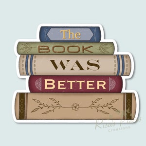 May include: A stack of vintage-style books with the text "The Book Was Better" on the front. The books are brown, green, blue, and red with decorative details.