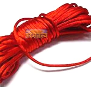 May include: A spool of bright red cord or string. The cord is wound tightly and is ready to be used for crafting or other projects.