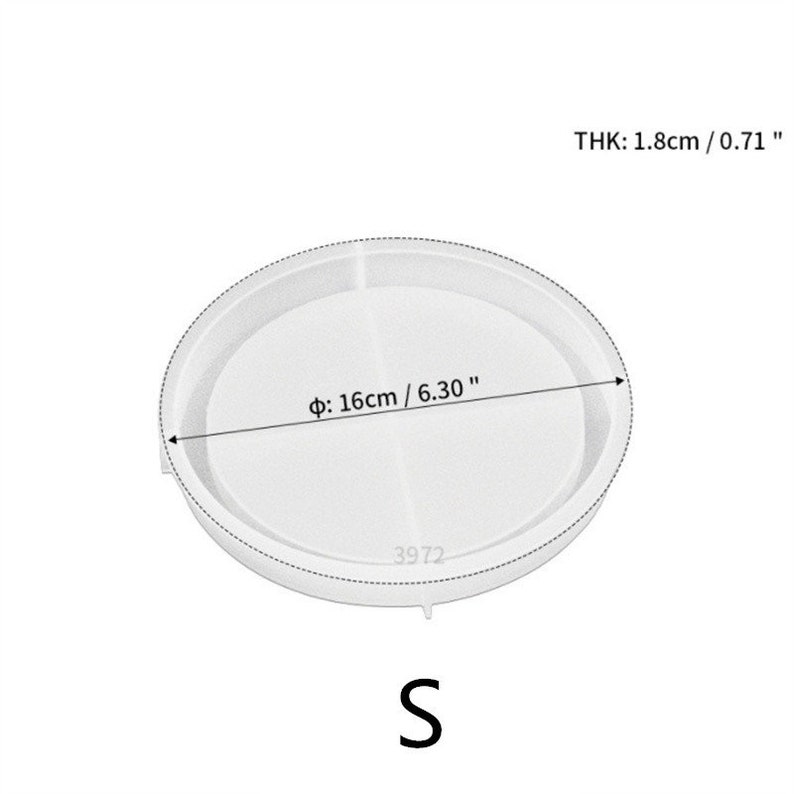 May include: White silicone mold for crafts, measuring 6.30 inches in diameter and 0.71 inches in thickness. The mold is labeled "S".