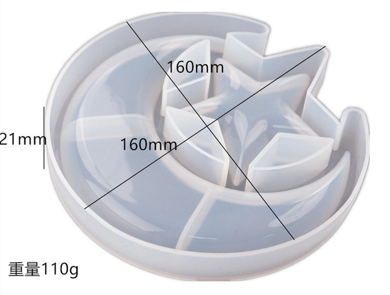 May include: A clear silicone mold shaped like a crescent moon with a star inside. The mold is 160mm in diameter and 12mm tall. The mold weighs 110g.
