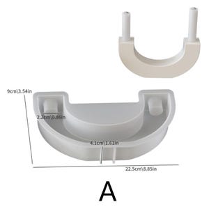 May include: A white, semi-circular mold with two cylindrical posts and a rounded base. The mold is labeled "A" and includes measurements: 22.5 inches wide, 3.54 inches high, and 1.61 inches deep. The mold is designed for crafting.